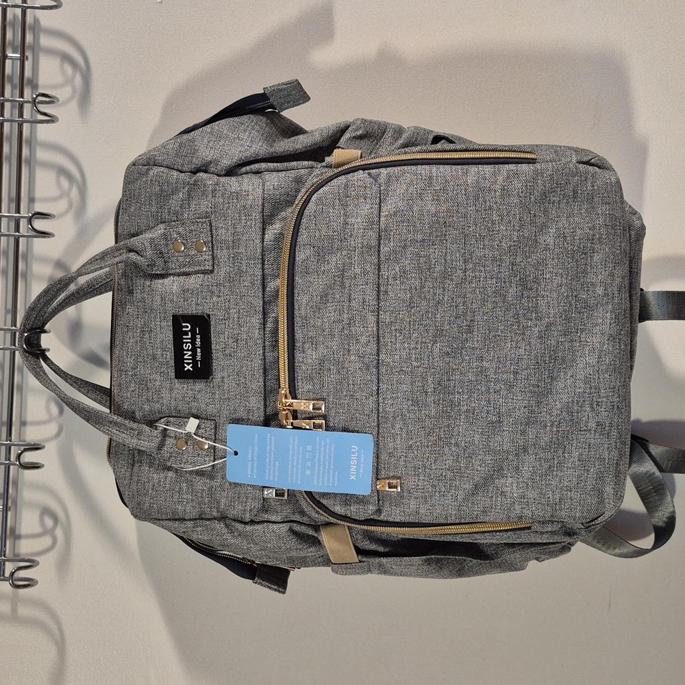 Xinsilu back pack baby bag with changing area